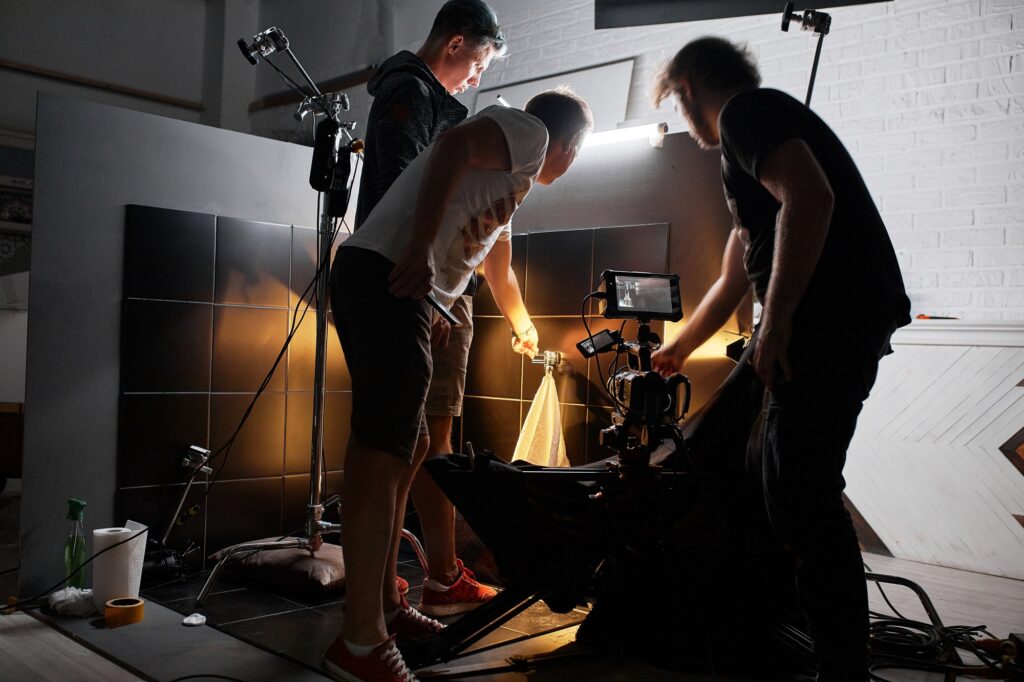 Video production backstage. Behind the scenes of creating video content, a professional team of